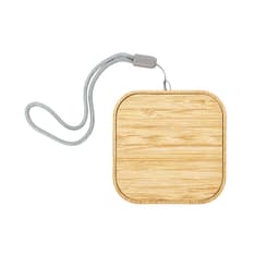 A square bamboo wireless charger with a grey strap. It features a smooth wooden surface and rounded edges.