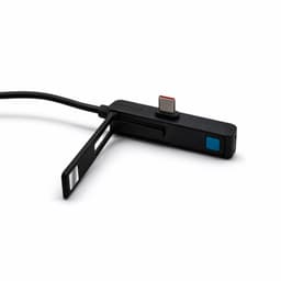 A black charging cable with a connector and a folding flap, featuring a blue button and a logo.