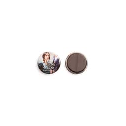 A round magnet featuring a colourful image on one side and a metallic backing on the other.
