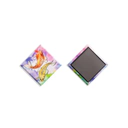 A diamond-shaped magnet featuring colourful illustrations of fish against a vibrant background, with a metallic finish on the edges.