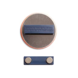 A round metallic 57mm magnet fastener badge with a blue backing and caution text, featuring a magnetic device.