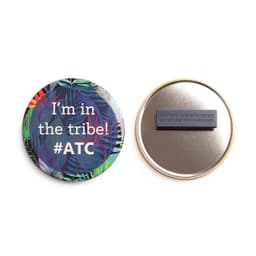 A round, custom printed 75mm magnet fastener badge featuring vibrant foliage design on one side and a smooth metallic back.