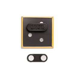 A square magnet fastener badge in black and gold, featuring a magnetic back and a smaller magnetic component.
