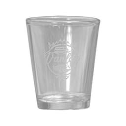 A clear glass shot glass with an engraved logo, featuring a nature-inspired design.