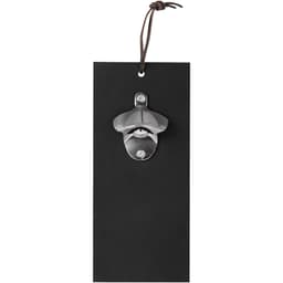 A drink bottle opener with a stainless steel top and a black backing, featuring a leather hanging strap.