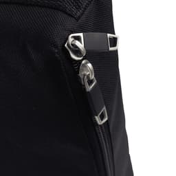 A close-up of a black fabric with a silver zipper and metal accents, featuring a sleek, modern design.