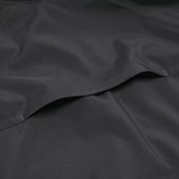 A black Oracle Softshell Jacket made from smooth fabric, featuring pockets and a subtle logo.