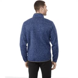 A men's knit jacket in a dark blue colour, featuring a high collar and a logo on the back.