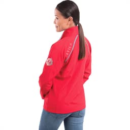 A red women's packable rain jacket with a logo on the sleeve and reflective detailing on the back.