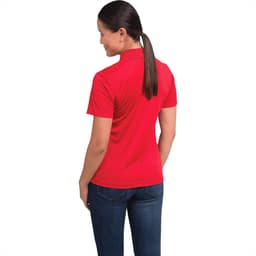 A red women's short sleeve polo shirt with a collar, featuring a logo on the back.