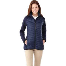 A women's insulated jacket in navy blue, featuring a zippered front and side pockets, with a logo on the sleeve.