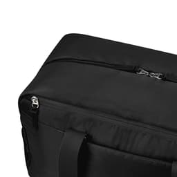 A black duffle bag featuring a zip closure and sturdy handles, with a logo present on the design.