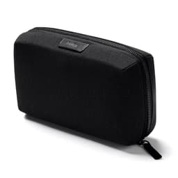 A black tech kit with a rectangular shape, featuring a textured surface and a zipper closure. It has a branding logo.