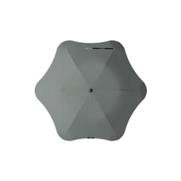 A grey umbrella with a unique shape, featuring a central button and a simple, modern design.