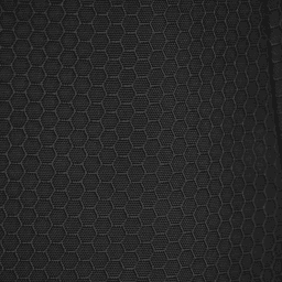 A textured black fabric featuring a hexagonal pattern, suitable for duffle bags and backpacks.
