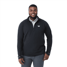 A man wearing a black eco-friendly quarter zip jacket with a logo on the chest, standing against a white background.