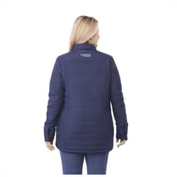 A woman wearing a navy insulated shacket with a logo on the back. The jacket features a quilted design.