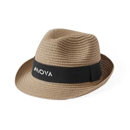 A tan straw fedora hat with a black band featuring a logo. The hat has a textured weave design.