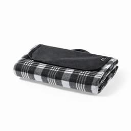 A folded blanket featuring a black and white checkered pattern, with a black fabric cover and strap.