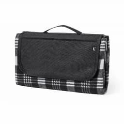 A picnic blanket featuring a black and white checkered pattern, folded with a handle for easy carrying.