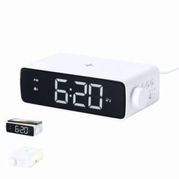 A digital alarm clock with a large LED display, featuring a white casing and buttons on the side.