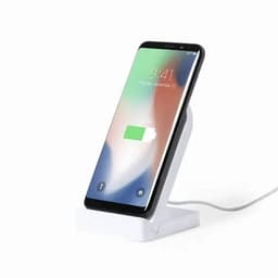 A wireless phone charger with a white stand, featuring a smartphone displaying a battery charging icon.