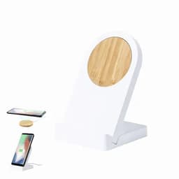 A white wireless charging stand with a wooden circular top, featuring a phone charging beside it.