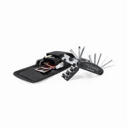 A multi-tool with various attachments laid out beside a sleek black carrying case.