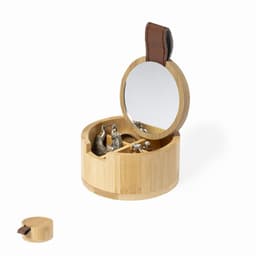 A circular bamboo jewellery box with a mirror and compartments for storage. It features a brown leather handle.