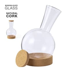 A clear glass drink bottle with a natural cork base and a tapered neck. Features a minimalist design with a cork accent.