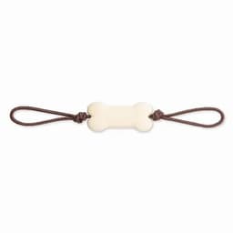 A dog toy featuring a bone-shaped centre in cream, with brown loops on either end for easy grip.
