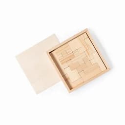 A wooden puzzle set in a square frame, featuring various geometric pieces, with a plain lid beside it.
