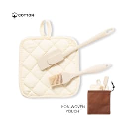 A cream quilted pot holder with a beige silicone spatula and brush, along with a brown non-woven pouch.