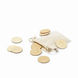 A muslin pouch contains wooden tokens with various engraved designs, scattered around on a white background.