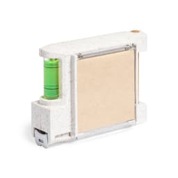 A compact measuring tool with a green spirit level and a holder for a notepad, featuring a speckled white finish.
