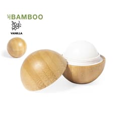 A bamboo container with an open lid revealing a vanilla-scented solid product inside. Features a logo on the top.