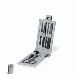 A grooming kit featuring various tools, including scissors, tweezers, and a nail file, in a grey case.