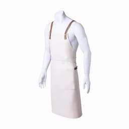 A cream-coloured apron with leather straps and a front pocket, displayed on a mannequin.