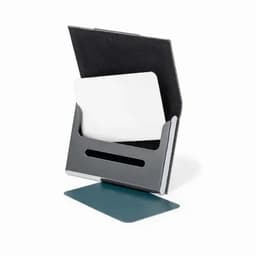 A cardholder with a black and grey design, featuring a slot for a card and a flat base for support.