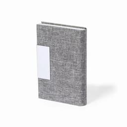 A grey fabric-covered notebook featuring a blank label space on the front.