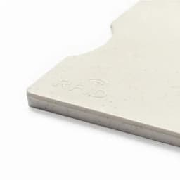 A grey RFID blocking card with a smooth finish and rounded edges, featuring a subtle logo.