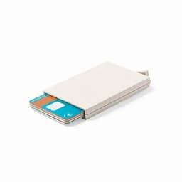A cardholder with a sleek, cream exterior and a blue and orange card partially extended from it.