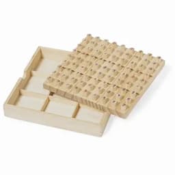 A wooden Sudoku game set with layered pieces, featuring numerous small numbered tiles in a grid layout.