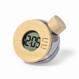 A digital clock with a bamboo and silver design, featuring a large display and rounded shape.