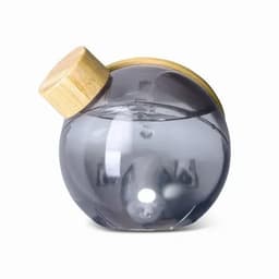 A drink bottle with a round shape, clear grey body, and a bamboo lid. It features a logo on the front.