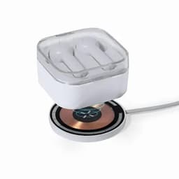 A wireless earbud charging station with a clear case, featuring white earbuds and a circular charging pad.
