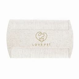 A pet comb in a light colour with a logo featuring a heart and a cat. It has coarse and fine teeth for grooming.