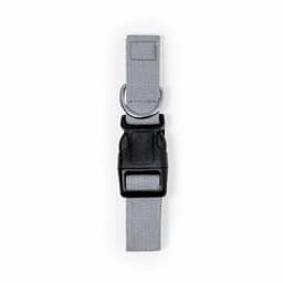 A grey strap with a black plastic buckle and metal loop, featuring a sturdy design and simple fastening mechanism.