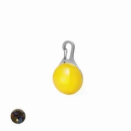 A yellow accessories ball with a silver clip for attachment. It features a shiny surface and rounded shape.