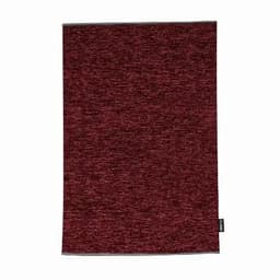 A maroon textured towel with a small brand tag at the bottom. The fabric appears soft and absorbent.